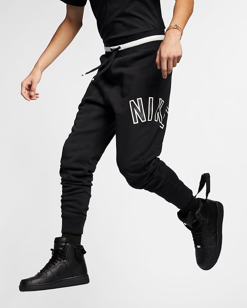 Купить черные брюки nike sportswear с резинкой внизу CN9127-010